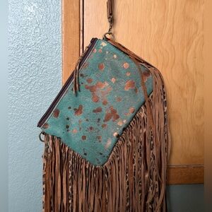 DCL Bucker acid wash w/copper and cheetah fringe.